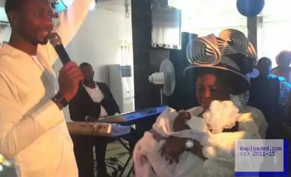 Photo of Patience Jonathan at the dedication of her grand daughter